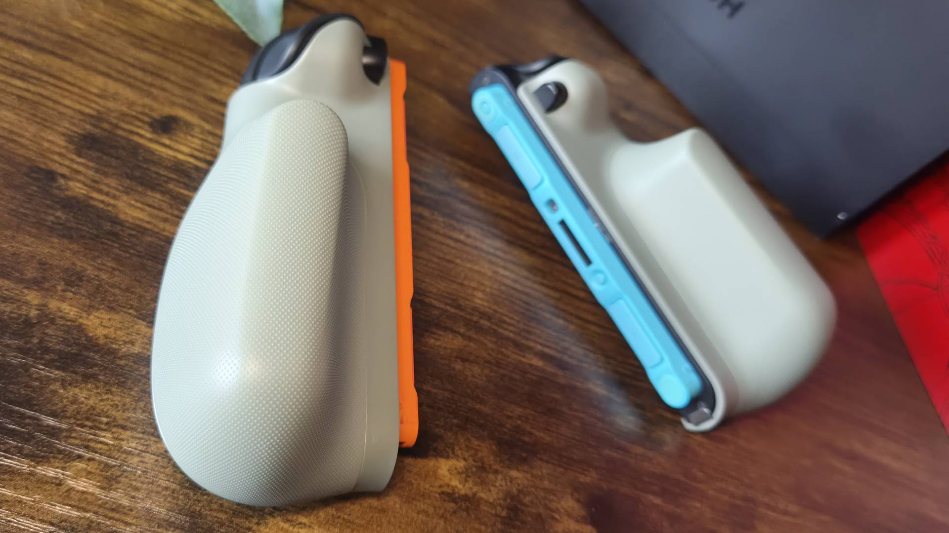 Photo of the Belkin Charging Grip handles on a pair of Switch 2 Joy-Cons.