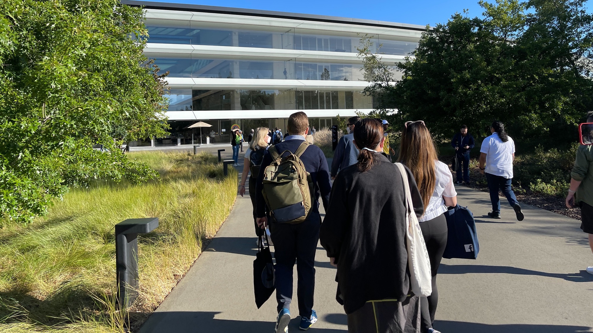 People entering Apple Park at WWDC 2022