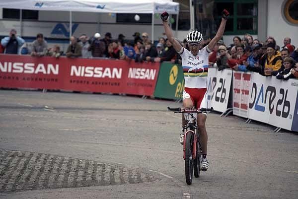 Sauser crosses the line