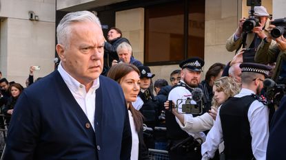 Huw Edwards leaves Westminster Magistrates' Court after receiving a six-month jail sentence, suspended for two years, for accessing indecent images of children