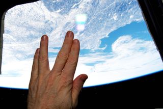 Astronaut Terry Virts tweeted this image of a Vulcan hand salute from orbit as a tribute to actor Leonard Nimoy, who died on Feb. 27, 2015. Nimoy played science officer Mr. Spock in the "Star Trek" series that served as an inspiration to generations of scientists, engineers and sci-fi fans around the world.