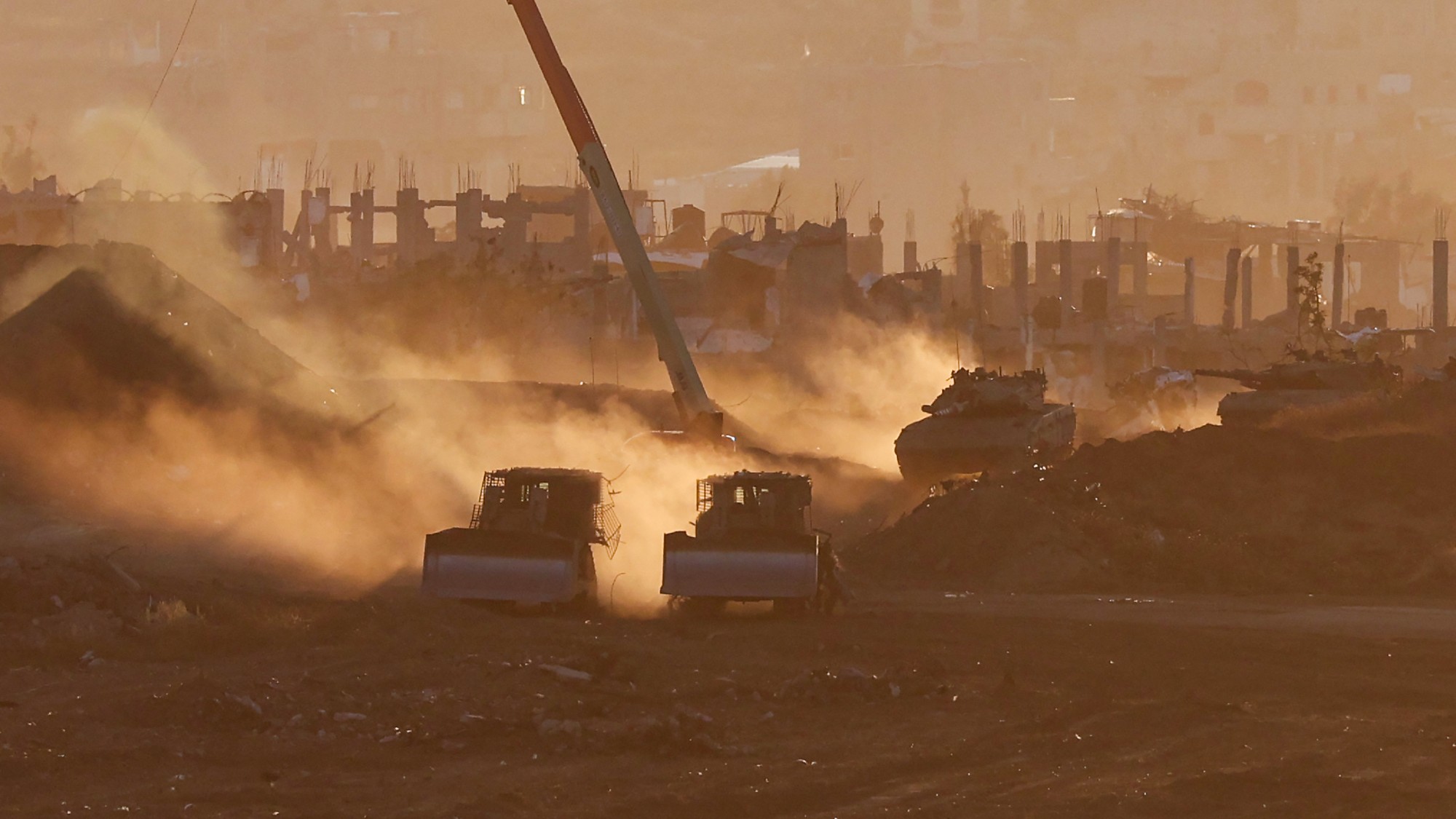 Israeli army vehicles deployed at along Israel's border with the Gaza Strip