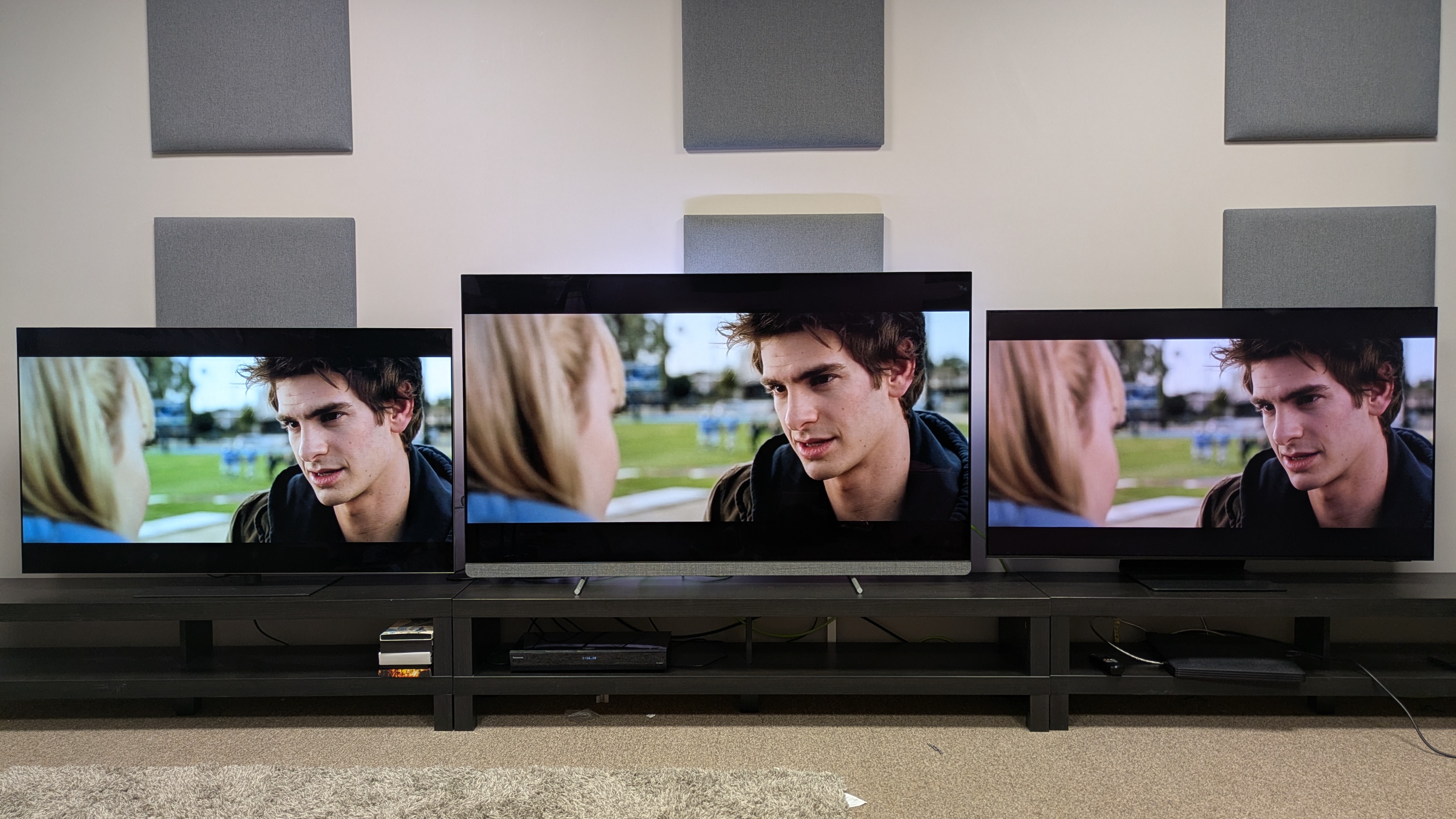 LG G5 (left) vs Philips OLED910 (middle) vs Samsung S95F (right) showing the Amazing Spider-Man on screen