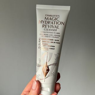 Laura holding Charlotte Tilbury Charlotte's Magic Hydration Revival Cleanser - best cleansers