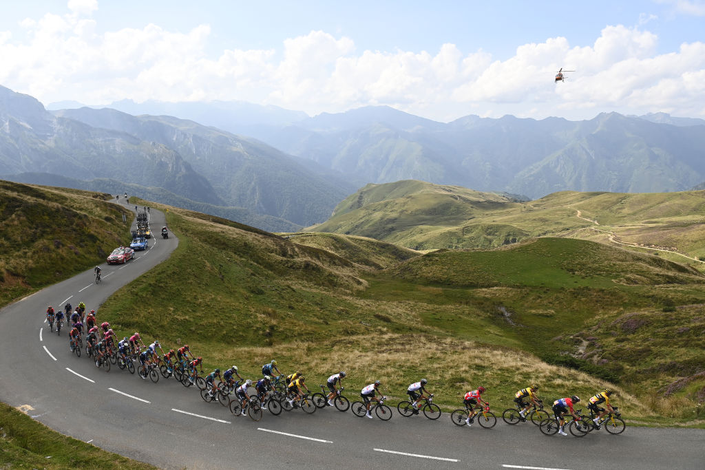 COL DU TOURMALET, FRANCE - SEPTEMBER 08: A general view of the peloton climbing to the Col d&amp;amp;apos;Aubisque (1.709m) during the 78th Tour of Spain 2023 a 134.7km stage from Formigal. Huesca la Magia to Col du Tourmalet 2115m / #UCIWT / on September 08, 2023 in Col du Tourmalet, France. (Photo by Tim de Waele/Getty Images)