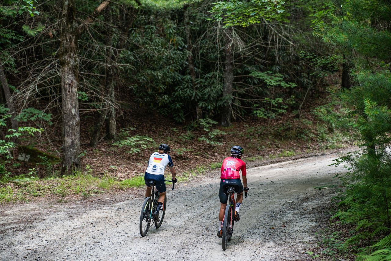 Women's winner Lauren De Crescenzo passed an assortment of riders as she worked on the second half of the course ahead of other elite women