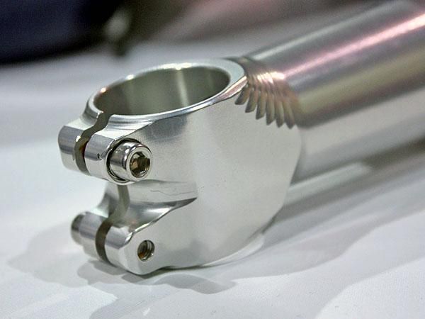 The full-coverage steerer clamp on Sampson's new Stratics CN stem looks to be very carbon-friendly.
