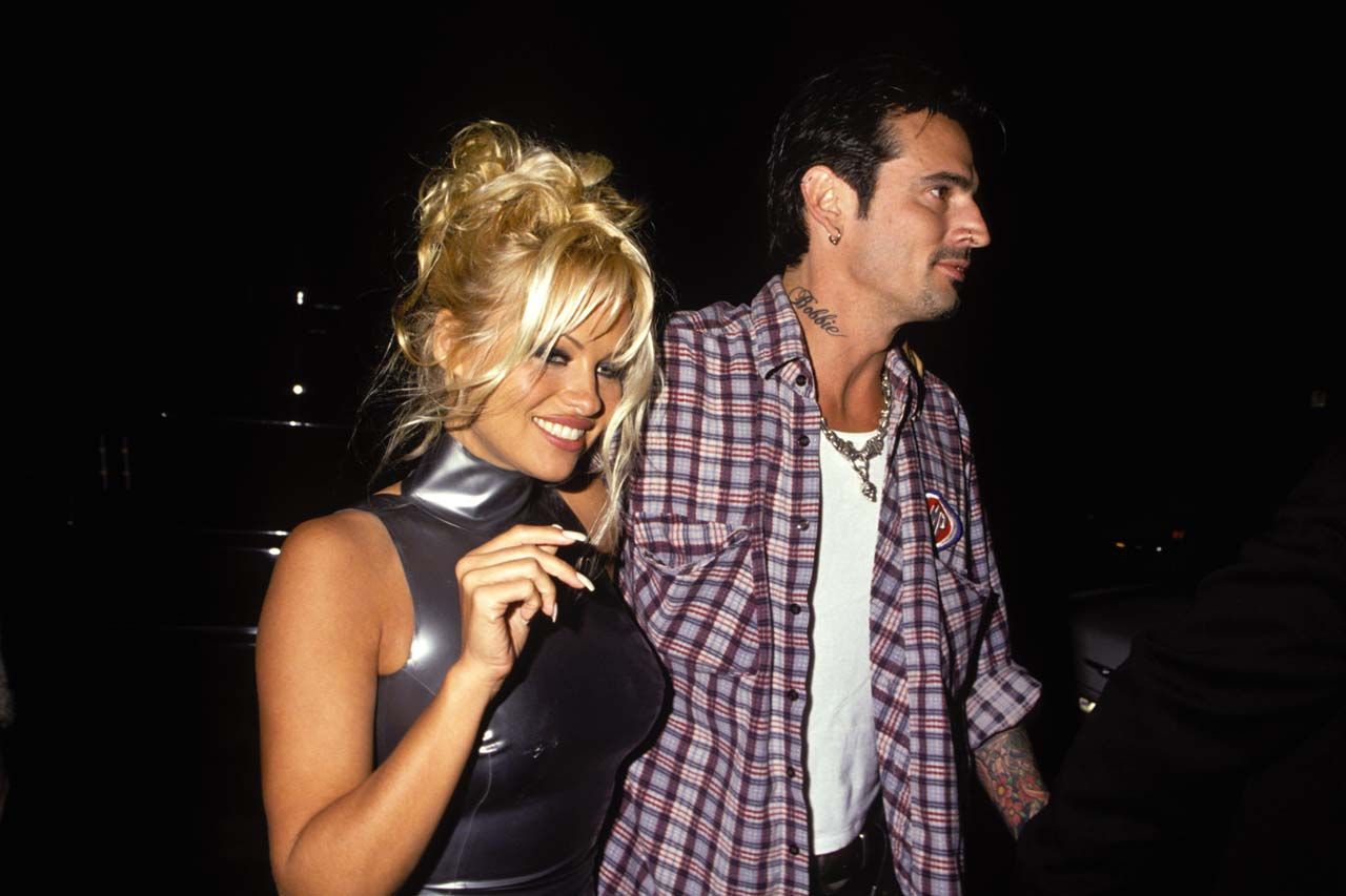 Pamela Anderson and Tommy Lee at their post Wedding Party in LA. Thanks for dressing up, Tommy.