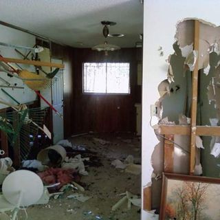 interior of house with white damage wall and window
