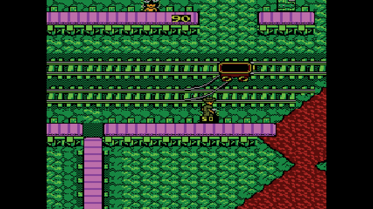 Indy next to a mine cart in the NES version of Indiana Jones and the Temple of Doom - from Retro Gamer magazine