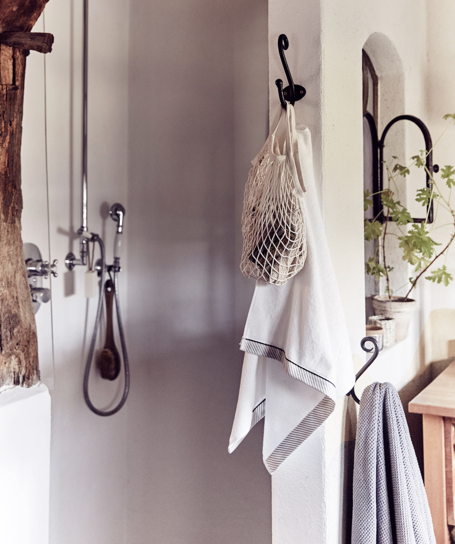 Ikea net bags used as bathroom storage