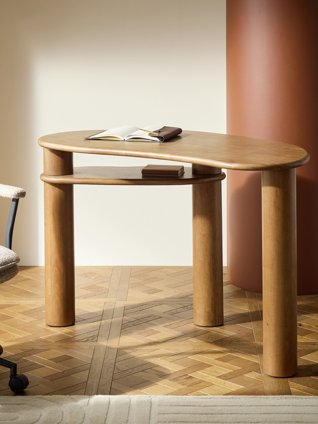 A stacked bean-shaped wooden desk from Habitat