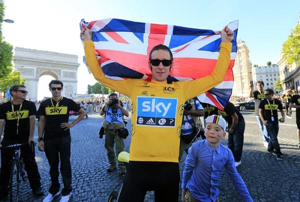 Tour de France champion Bradley Wiggins and his son on the Champs-&Eacute;lys&eacute;es.