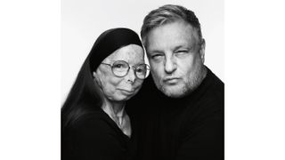 Black and white photo of fashion and portrait photographer Rankin and acid attack survivor Patricia Lefranc, photographed for the Tear Couture Look Book campaign