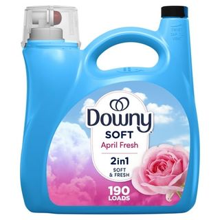 A blue bottle of Downy Liquid Fabric Softener with a white logo, and a pink and blue label with an image of a rose