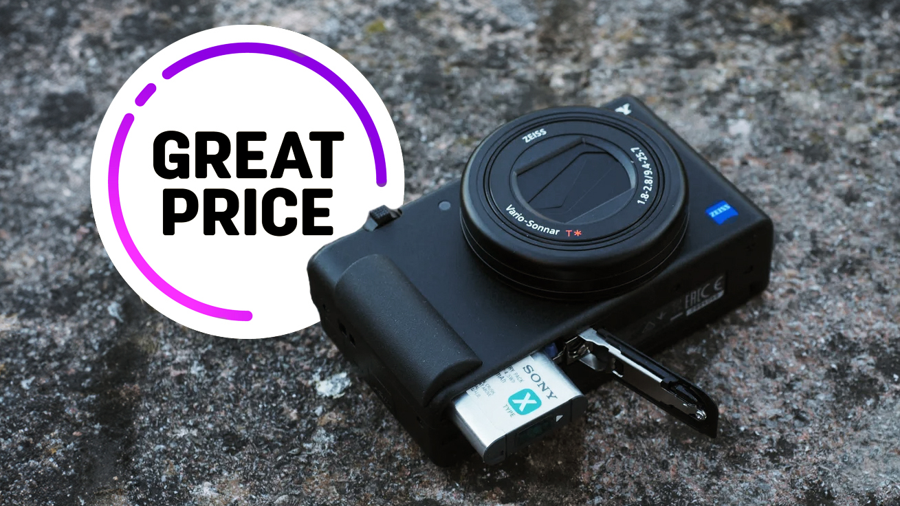 A compact camera with a Zeiss lens and a Sony memory card rests on a textured surface, accompanied by a &quot;Great Price&quot; graphic