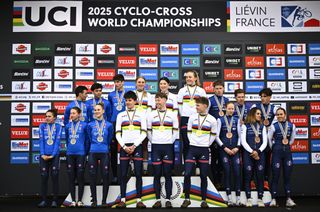 Italy, Great-Britain and France celebrate on the podium after the mixed team relay race, at the UCI Cyclocross World Championships, in Lievin, France, Friday 31 January 2025. The world championships are taking place from 31 January until 02 February.
BELGA PHOTO JASPER JACOBS (Photo by JASPER JACOBS / BELGA MAG / Belga via AFP)