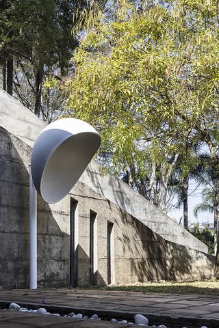 art and design pieces shown during aberto art and design fair in sao paulo inside the chu ming silveira brutalist house against raw concrete