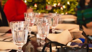 A glass of water at the Christmas dinner table