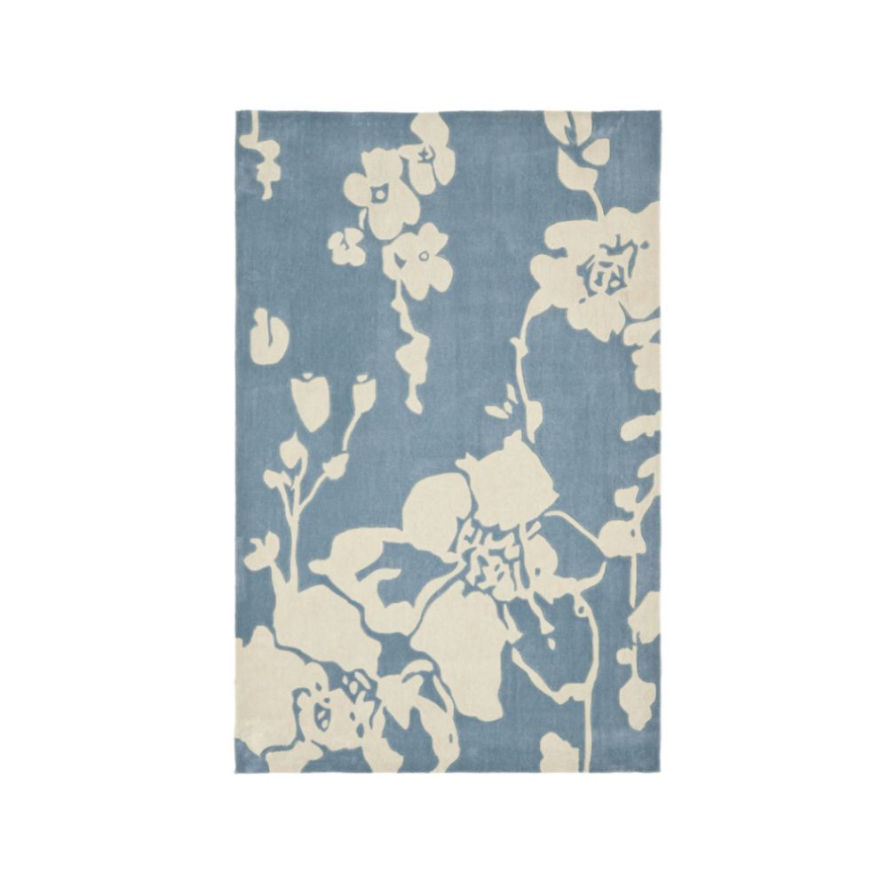 Pale blue rug with white floral pattern