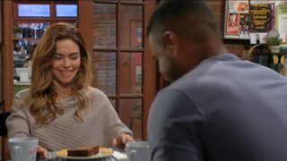 Amelia Heinle as Victoria smiling with Sean Dominic as Nate in The Young and the Restless