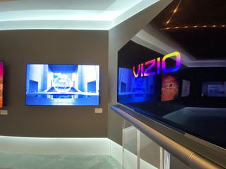 VIZIO new OLED TV provides true blacks. And the stand can be used to mount the new Elevate sound bar.