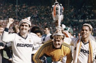 Luton Town's Steve Foster, Andy Dibble and Brian Stein celebrate with the League Cup, 1988