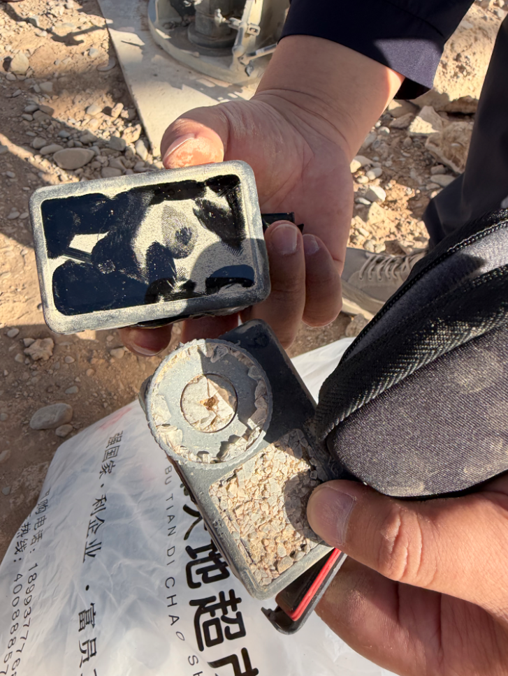 The charred remains of a DJI Osmo Action 6 camera recovered from a rocket after its space orbit