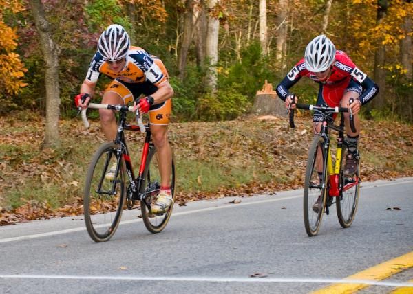 Valentin Scherz (Cyfac) outsprints Adam McGrath (Van Dessel) for the win.