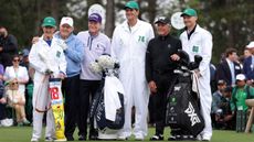 Jack Nicklaus of the United States, his wife Barbara Nicklaus, Tom Watson of the United States and Gary Player of South Africa pose for a photo on the first tee during the Honorary Starters ceremony prior to the first round of the 2024 Masters