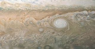 A photo of Jupiter's atmosphere taken by the Juno probe on Sept. 6, 2018, shows an anticyclone storm.