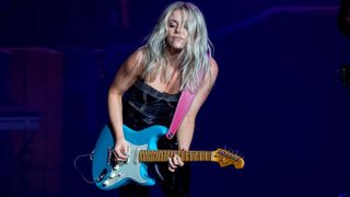 Lindsay Ell performs at DTE Energy Music Theater in support of "Beers On Me" tour on October 07, 2021 in Clarkston, Michigan.