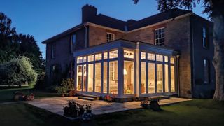 a conservatory illuminated from exterior