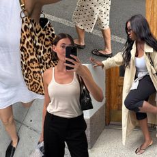 Influencer Anna wears a white linen shift dress with loafers and a cheetah print bag. Influencer Sarah Louise Blythe wears a cropped black pant, flip-flops, and a white scoop neck top. Influencer Poppy wears polka dot long shorts with a black crewneck top, a woven bag, and mesh ballet flats. Influencer Nnenna wears black capri pants with a white tank, trench coat, and flip-flop heels. 