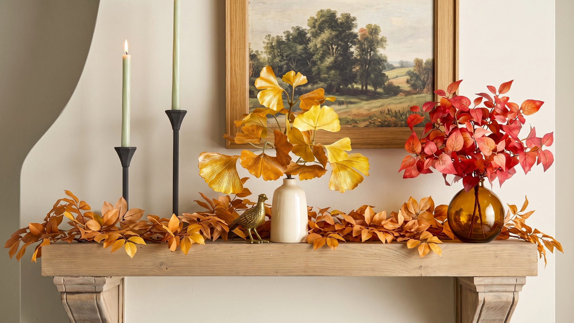 Faux fall foliage stems on a mantle