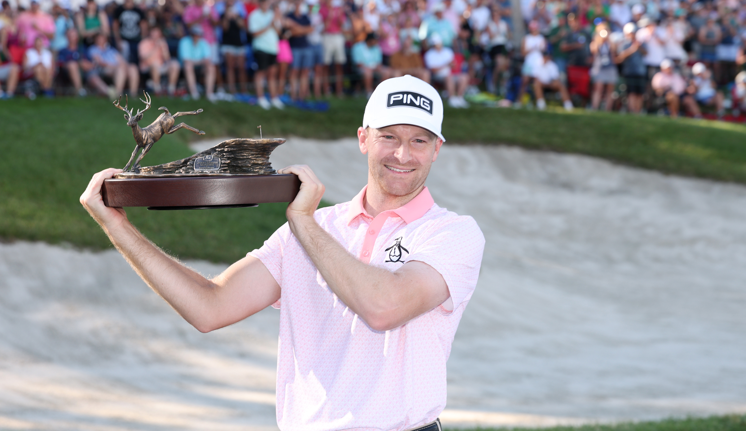 Brian Campbell holds the John Deere Classic trophy