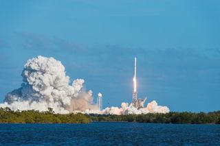 Private corporations are entering the space race — here, a SpaceX Falcon 9 is launched at the Kennedy Space Center.