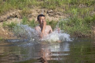 water, holding nose, jumping, swimming