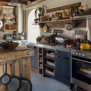 kitchen with cabinet and hanging pans