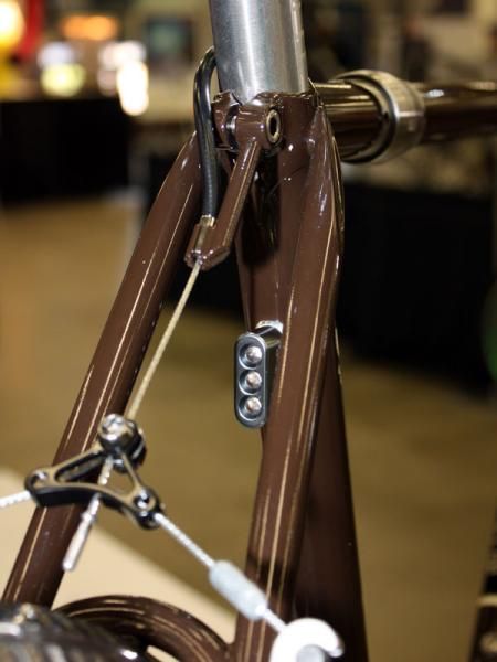 The rear light is bolted right to the seat tube and the rear brake hanger is neatly integrated into the seat binder.