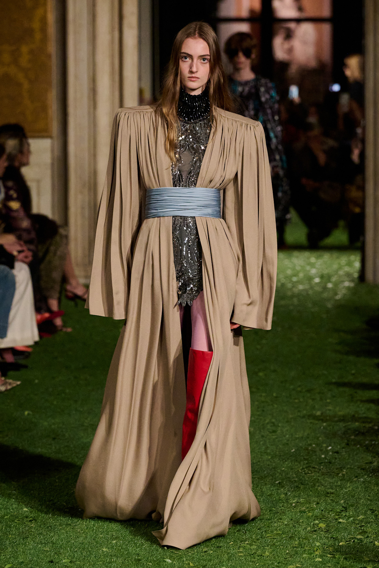 Photos of runway models at Valentino Fall Winter 2026 show.