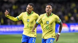 Rodrygo Goes, wearing yellow and green Brazilian football jersey, celebrates after scoring the first goal of the match during the FIFA World Cup 2026 Qualifier, ahead of the Paraguay vs Brazil live stream