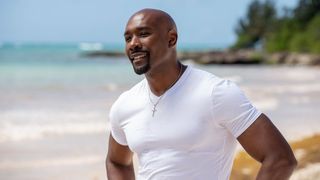 Morris Chestnut as Lance on the beach in The Best Man: The Final Chapters