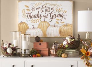 Thanksgiving cornucopia decor with mixed fall floral arrangement