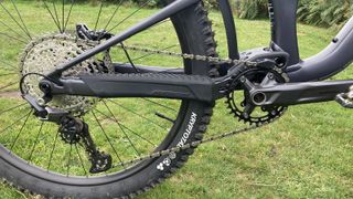 Close up of drivetrain on Merida One-Sixty FR with field and hills in background