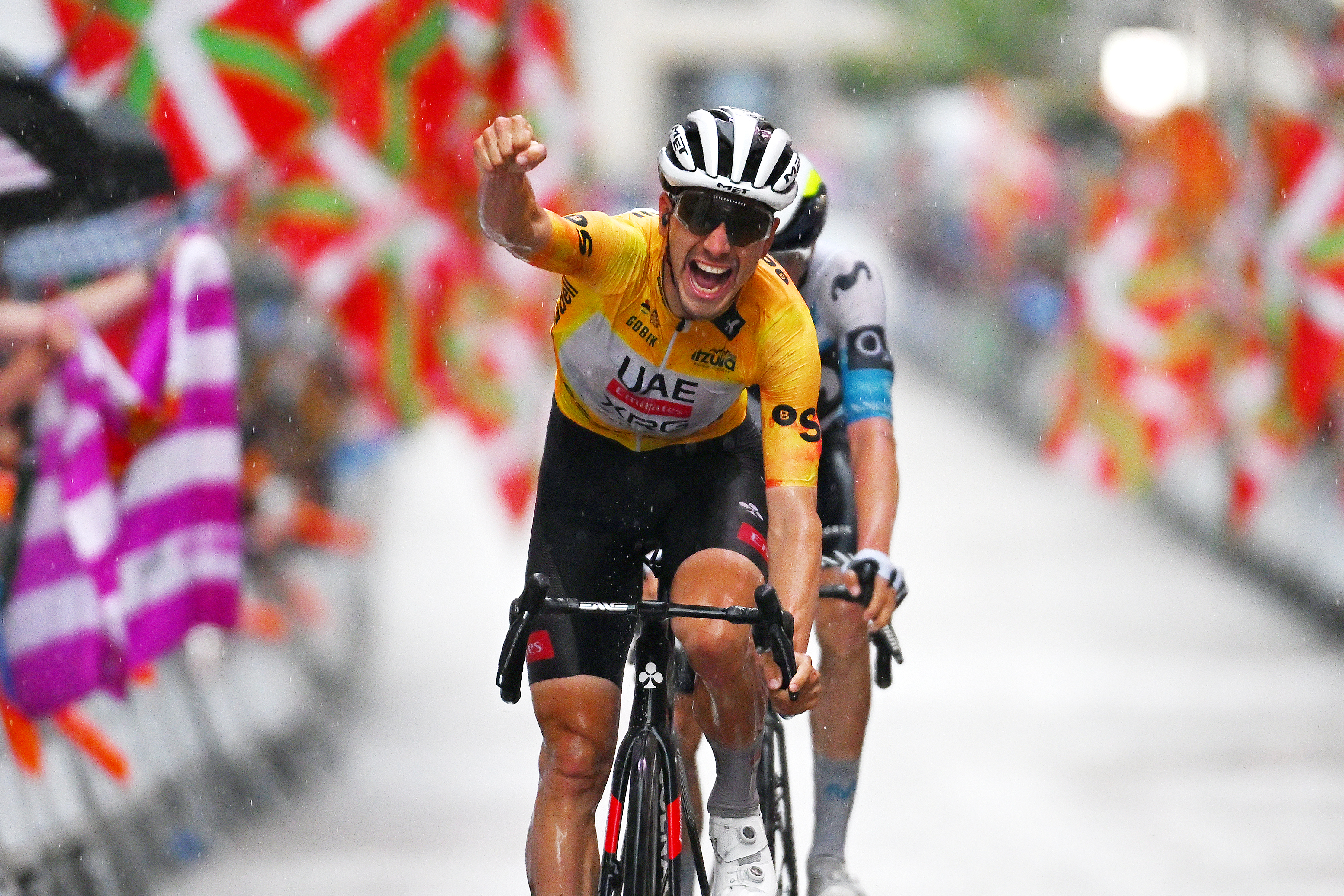 EIBAR, SPAIN - APRIL 12: (EDITOR'S NOTE: Alternate crop) Joao Almeida of Portugal and UAE Team Emirates - XRG - Yellow Leader Jersey celebrates at finish line as stage winner during the 64th Itzulia Basque Country 2025, Stage 6 a 153.4km stage from Eibar to Eibar / #UCIWT / on April 12, 2025 in Eibar, Spain. (Photo by Tim de Waele/Getty Images)