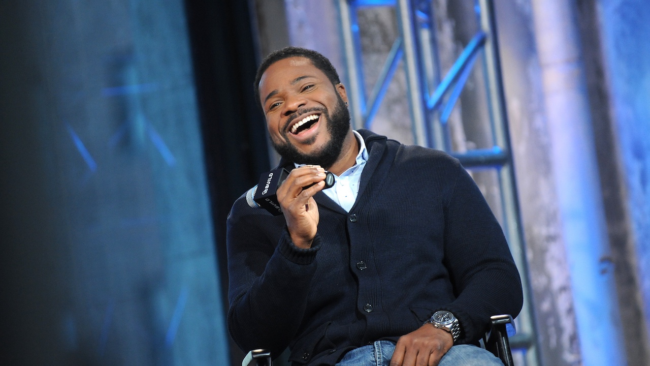  Malcolm-Jamal Warner smiling while talking about his role in American Crime Story back in 2016 