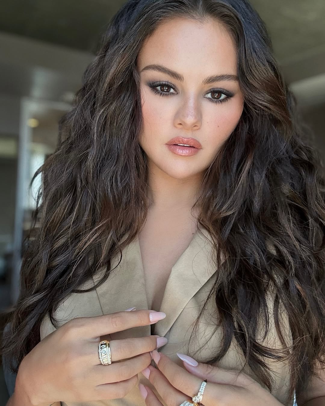 Selena Gomez with ash brown hair by Marissa Marino.