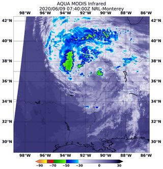On June 9 at 3:40 a.m. EDT (0740 UTC) the MODIS instrument that flies aboard NASA’s Aqua satellite showed strongest storms in Tropical Depression Cristobal were northeast and north of the elongated center over western Missouri, Iowa and Illinois, where cloud top temperatures were as cold as minus 63 degrees Fahrenheit (minus 56.6 Celsius).