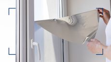 picture of person putting foil film on windows